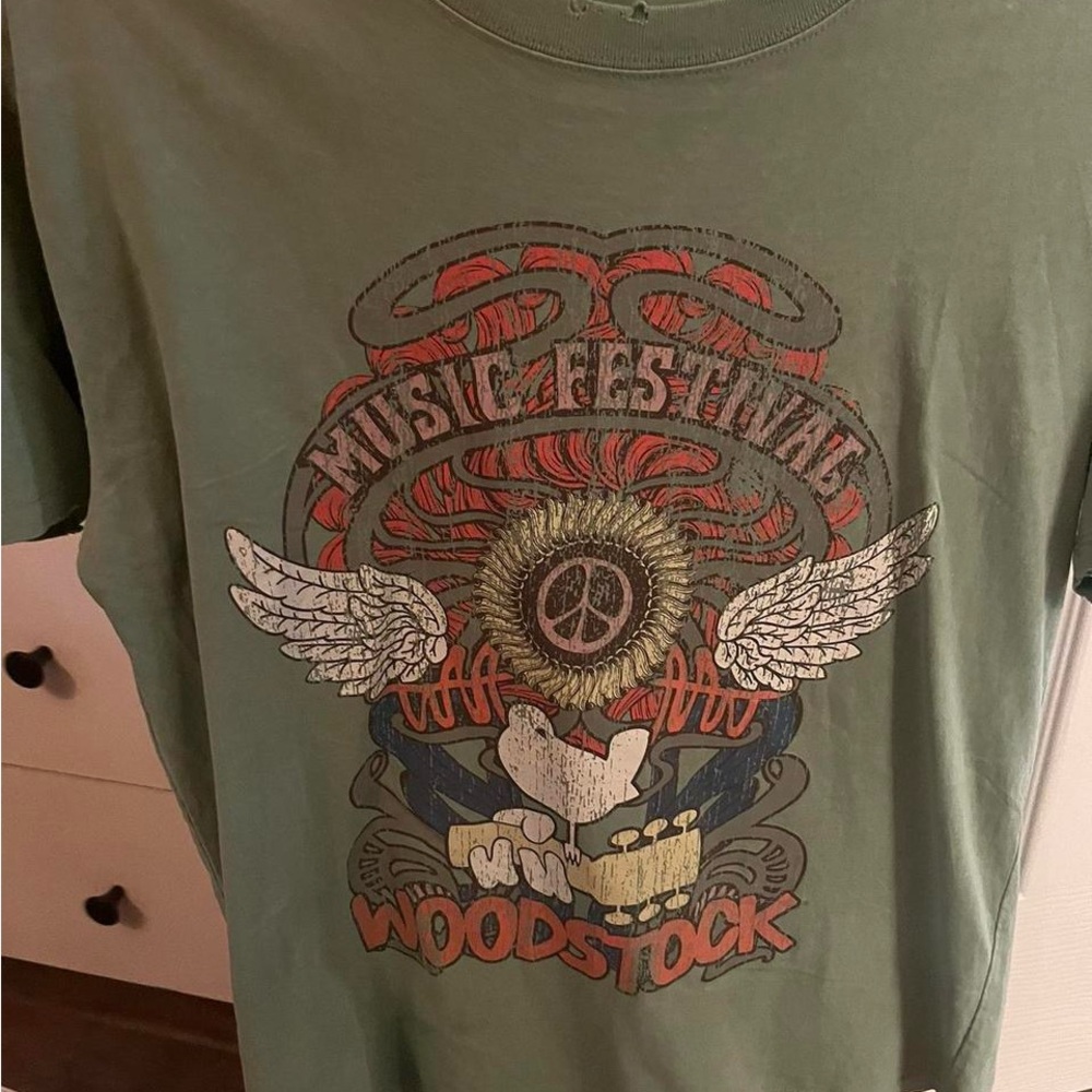 Woodstock green tee shirt